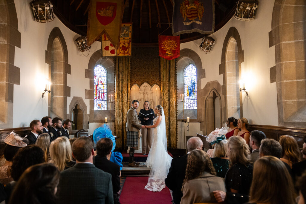 wide angle of the wedding ceremony in the chapel