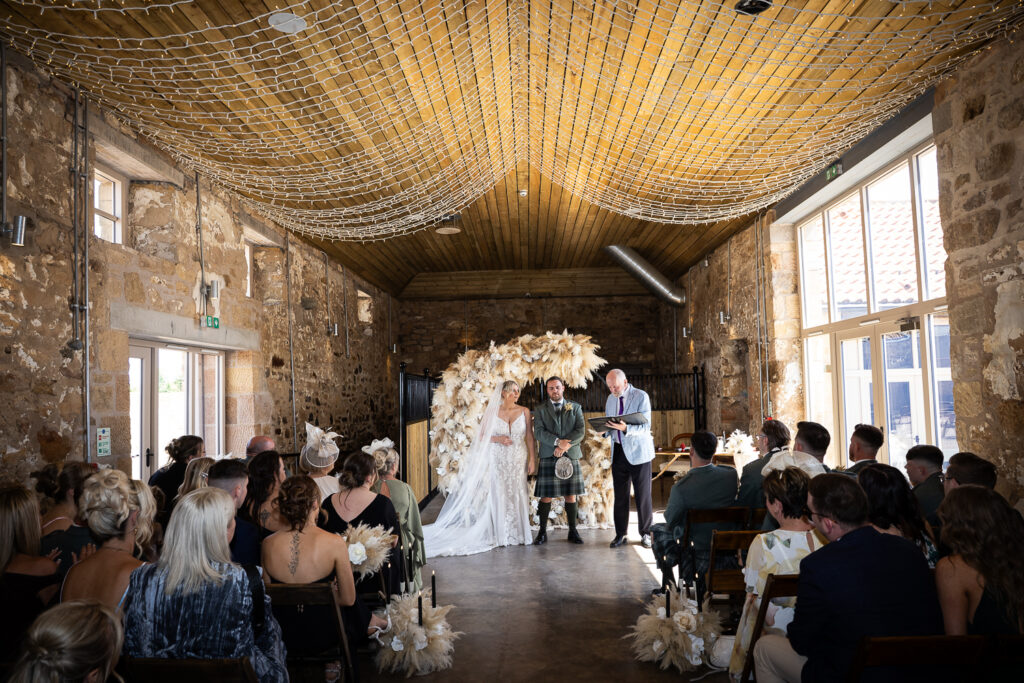 wide angle of the ceremony at falside mill