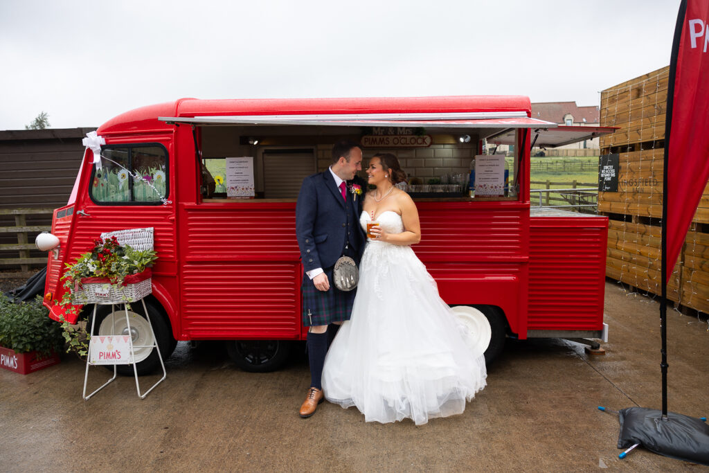 couple next to classic van bar