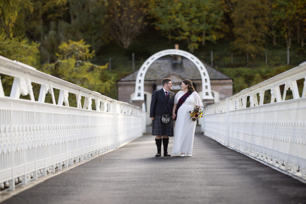 couple portrait on an iron bride at Mar Lodge